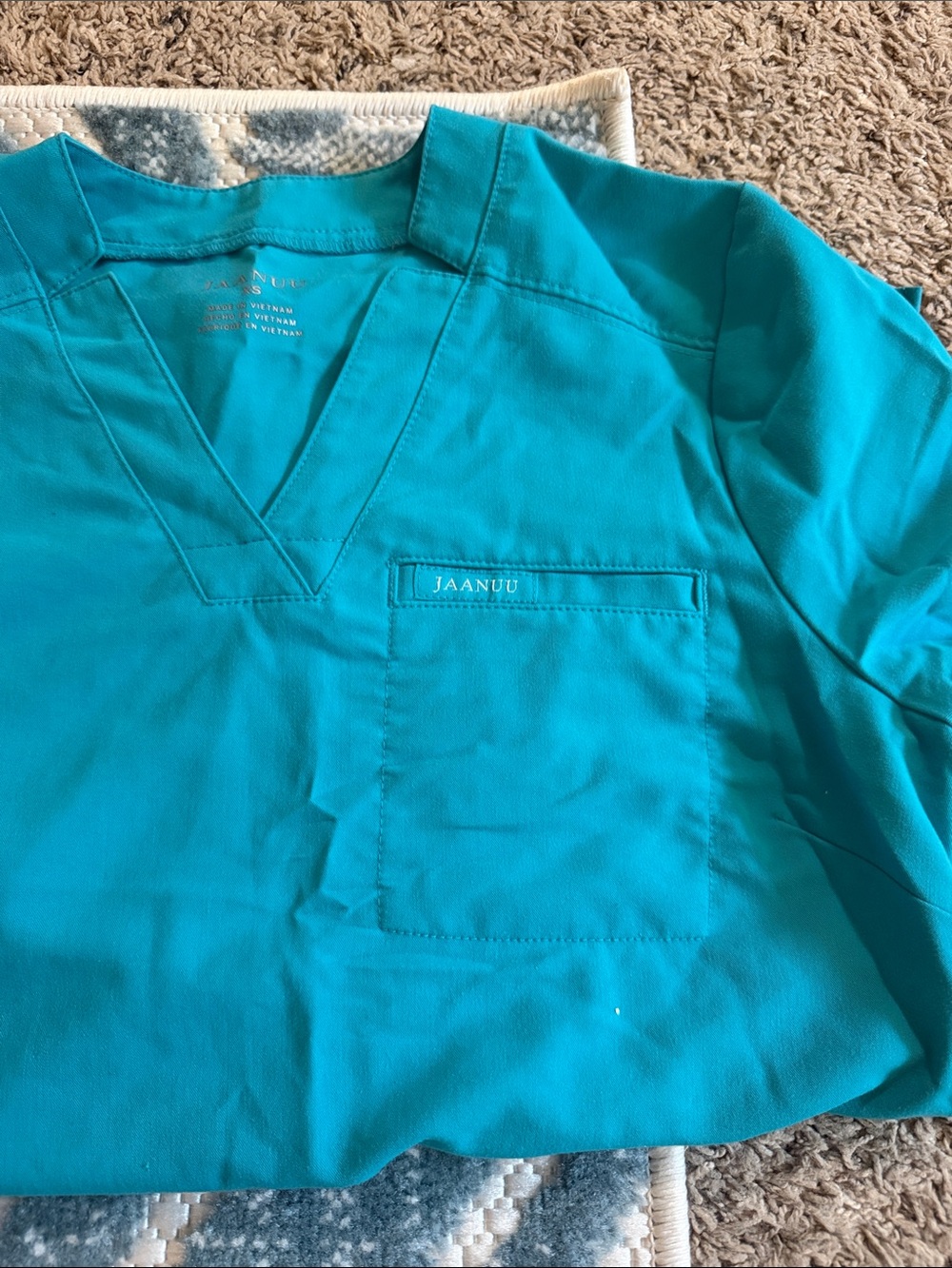 Jaanuu women’s Teal Scrub Top